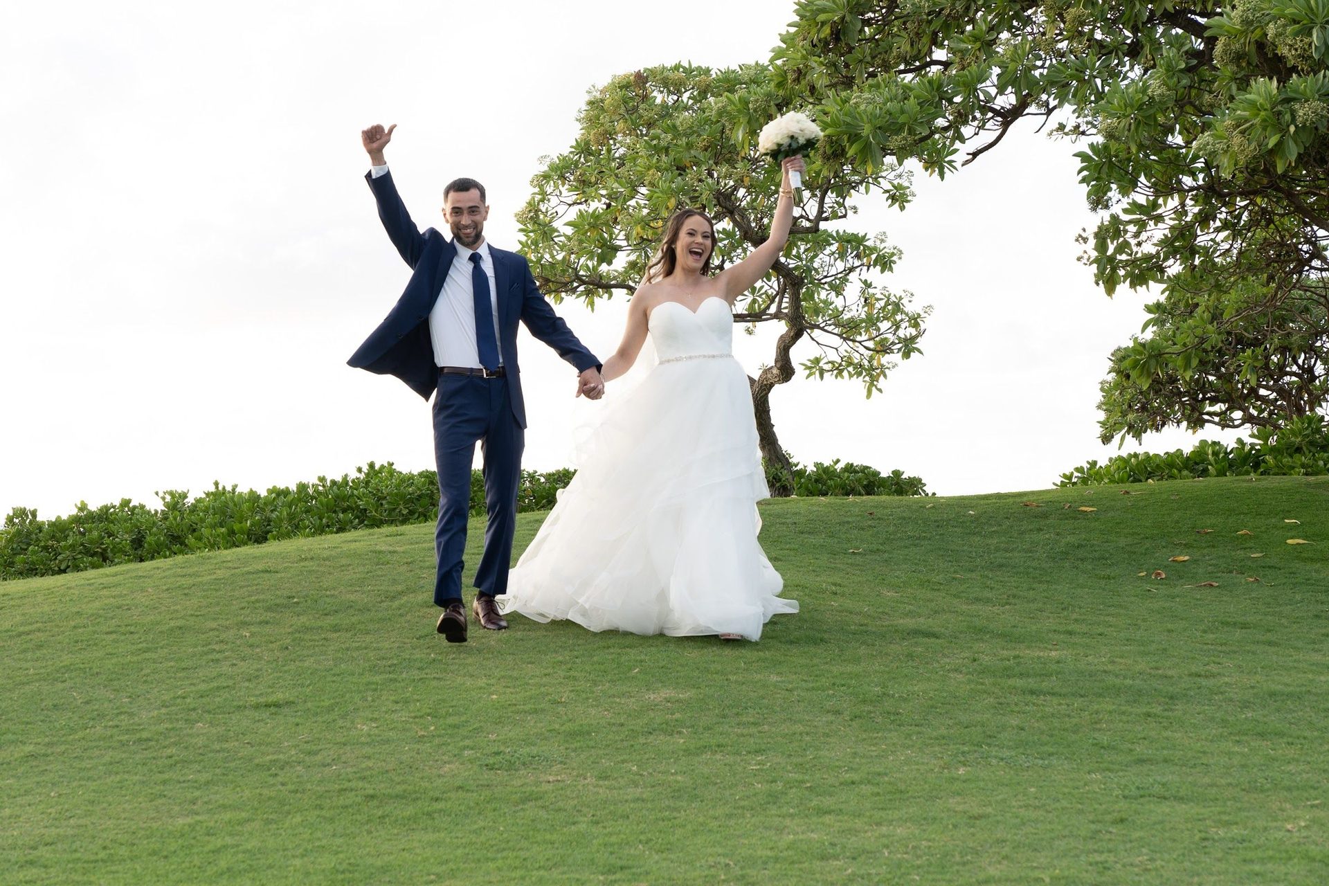 Groom leaping with joy during the reception, photographed by the IMF team